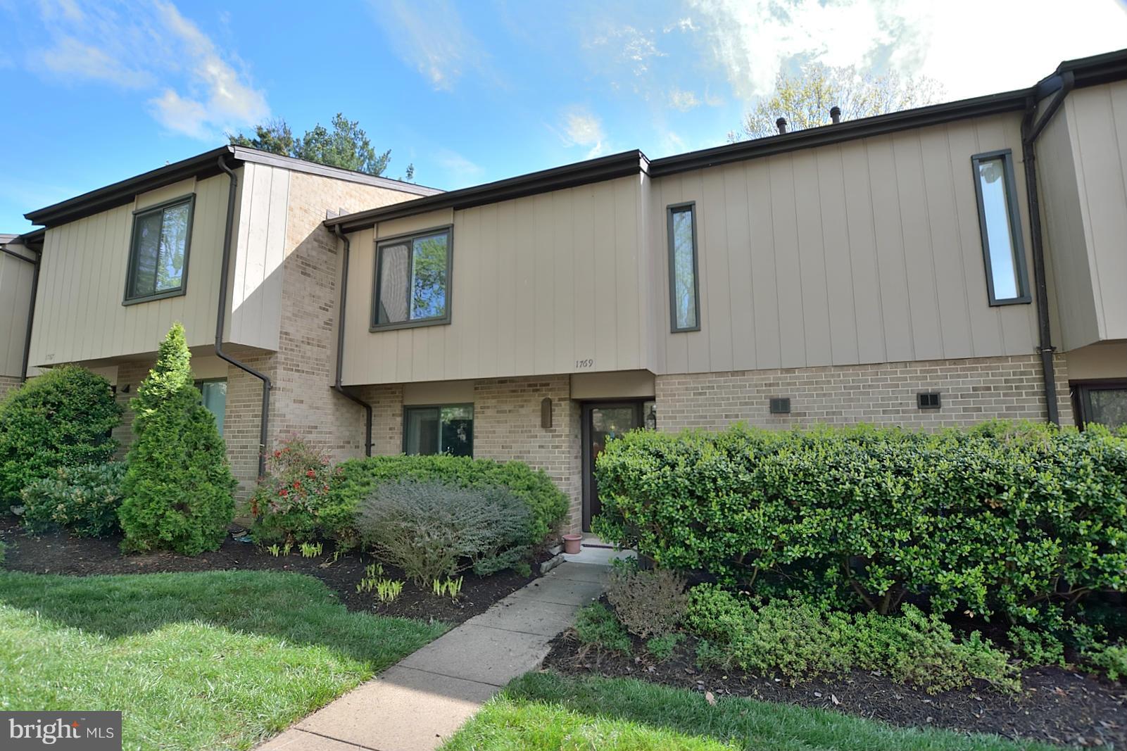 1769 Ivy Oak Square Reston, VA 20190 - Photo 1 of 24 a view of a back yard of the house