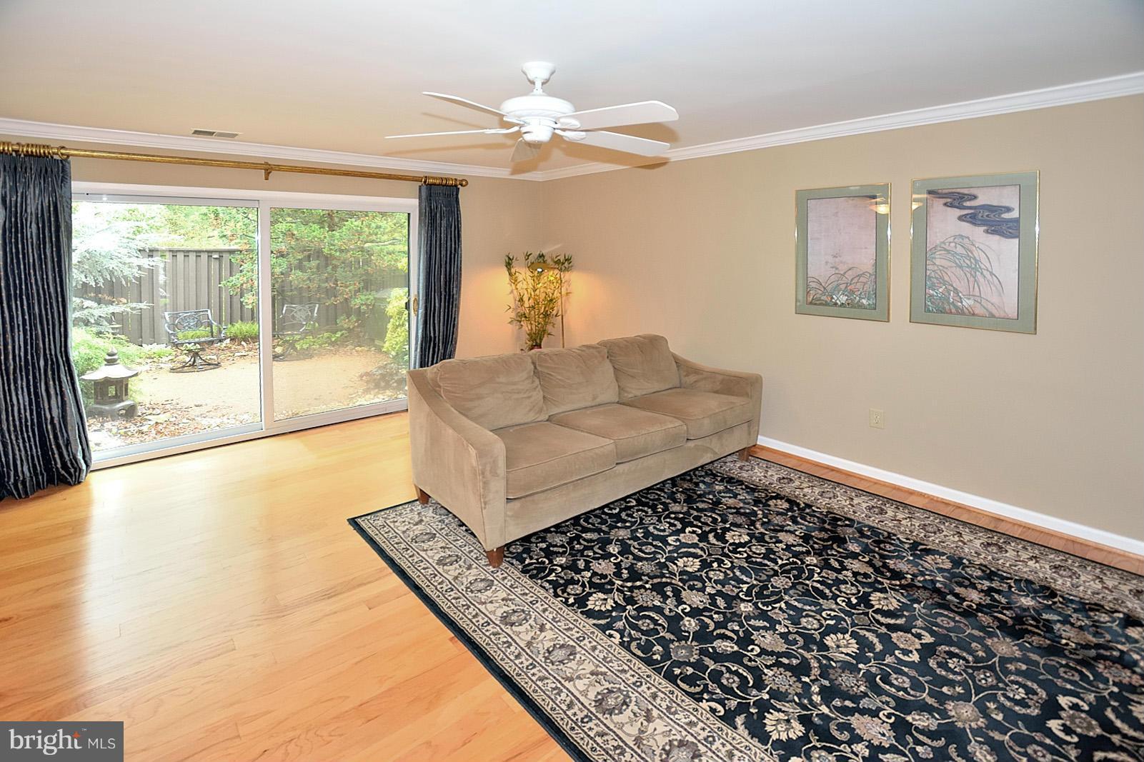 1769 Ivy Oak Square Reston, VA 20190 - Photo 11 of 24 a living room with a large window
