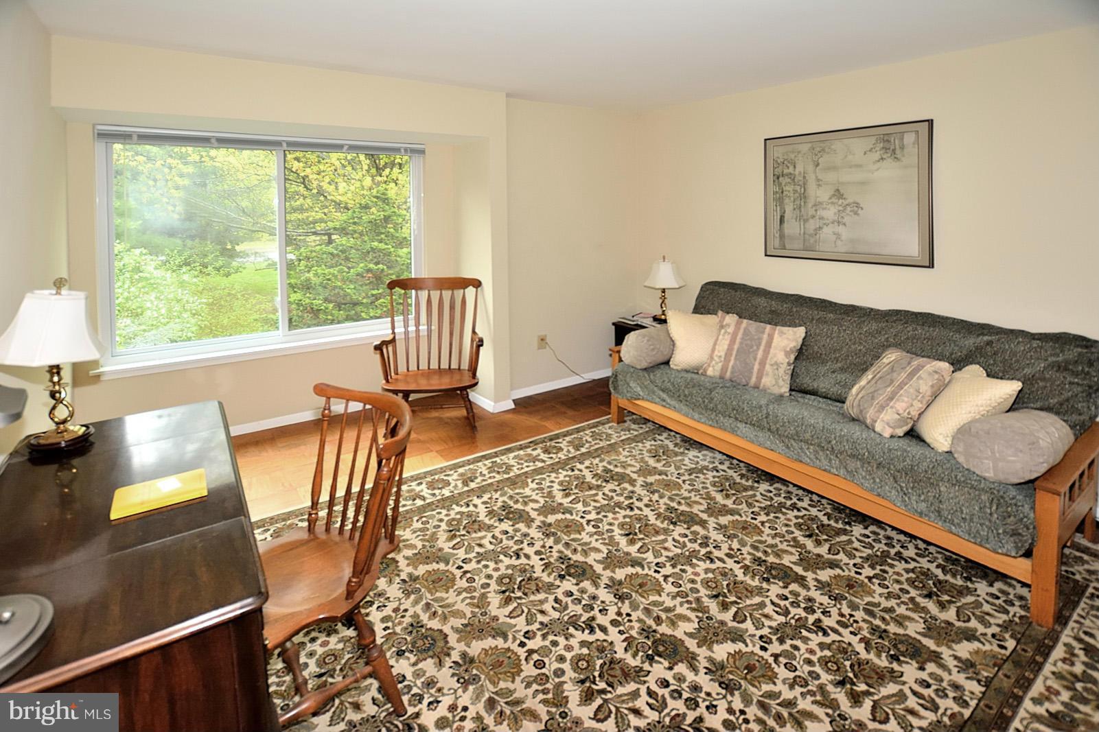 1769 Ivy Oak Square Reston, VA 20190 - Photo 18 of 24 a living room with furniture and a window