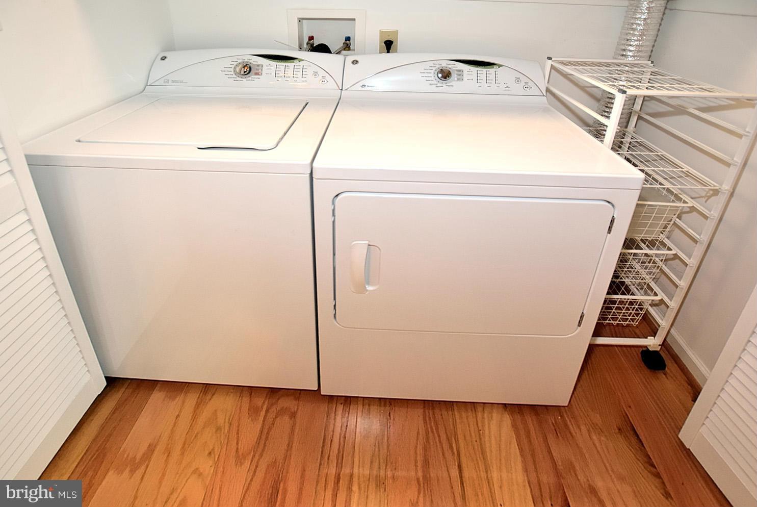 1769 Ivy Oak Square Reston, VA 20190 - Photo 21 of 24 a utility room with dryer and washer