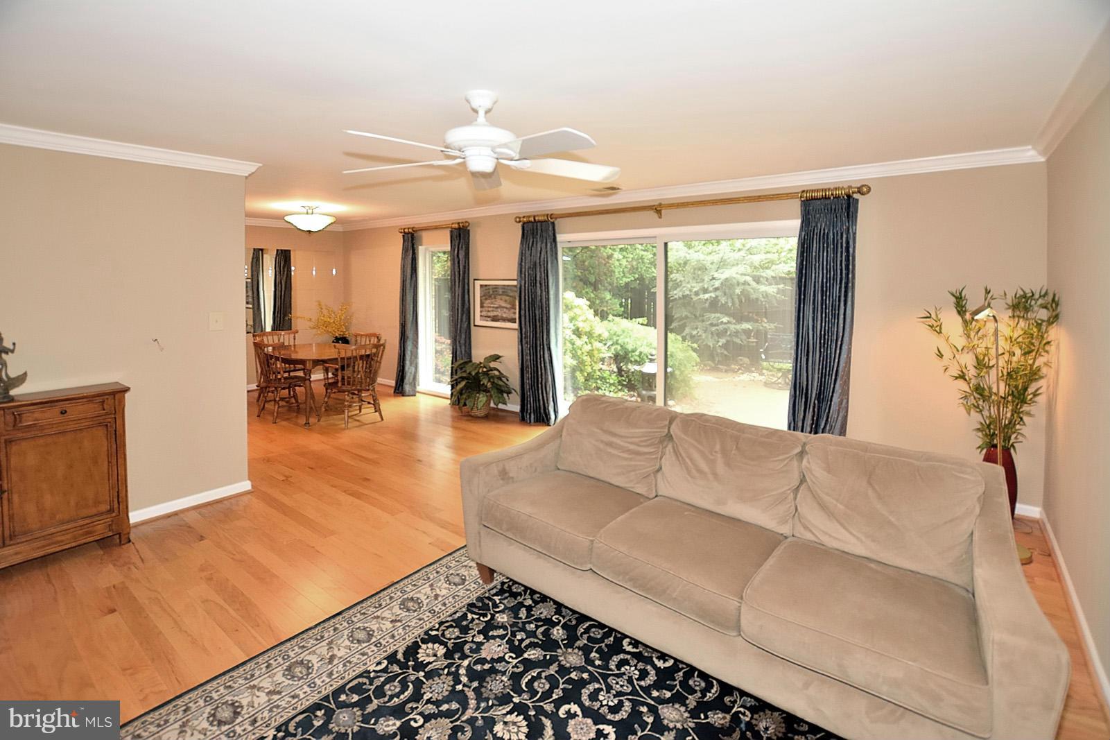 1769 Ivy Oak Square Reston, VA 20190 - Photo 10 of 24 a living room with furniture and a large window
