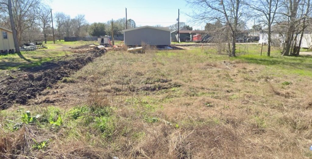 401-405 Elm View Road Kendleton, TX 77451 - Photo 2 of 2 a view of outdoor space with deck and yard