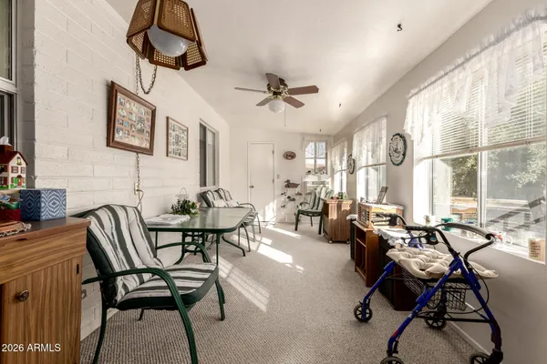 a workspace with furniture and a window