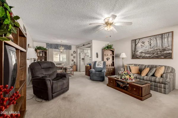 a bathroom with a shower and a plant