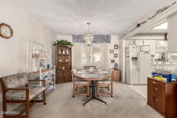 a living room with furniture and flat screen tv