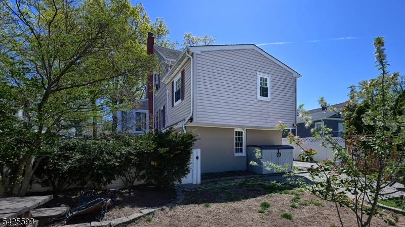 178 Jackson Avenue Rutherford, NJ 07070 - Photo 29 of 29 a front view of a house with garden