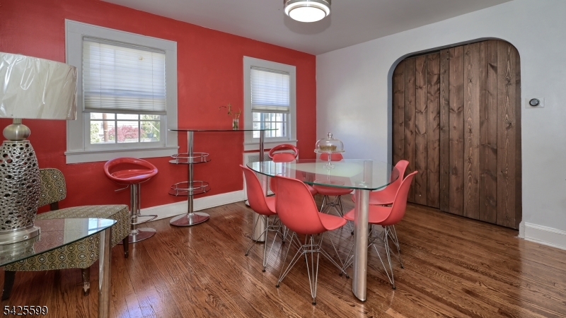 178 Jackson Avenue Rutherford, NJ 07070 - Photo 8 of 29 a dining room with furniture and wooden floor