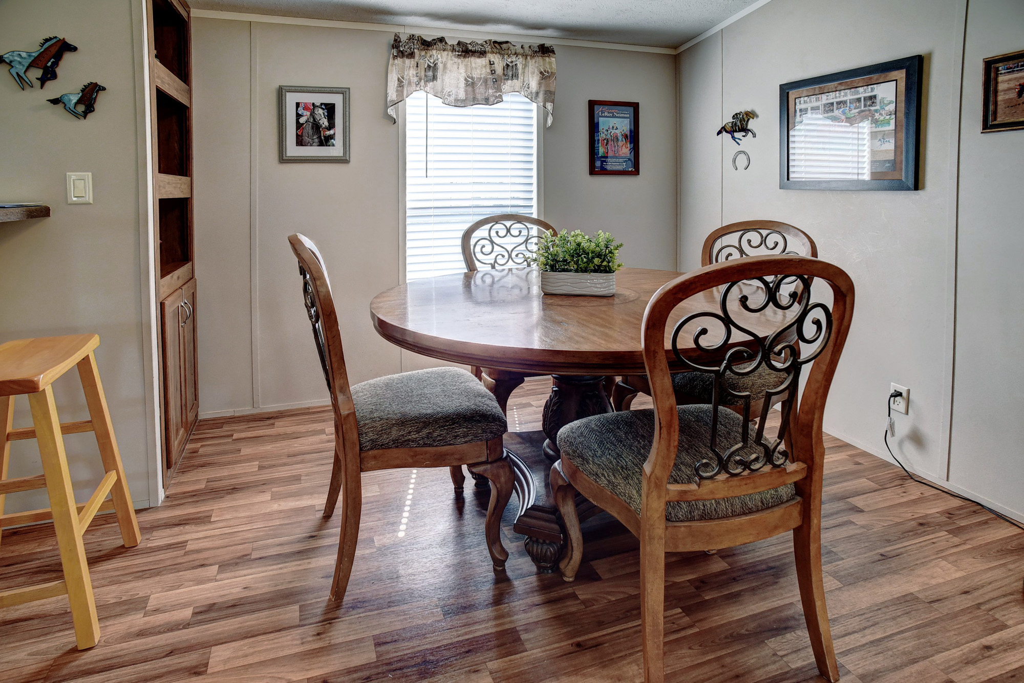 4495 Taylorsville Road Red Rock, TX 78662 - Photo 13 of 40 The built-in natural wood shelving adds warmth and functionality.
