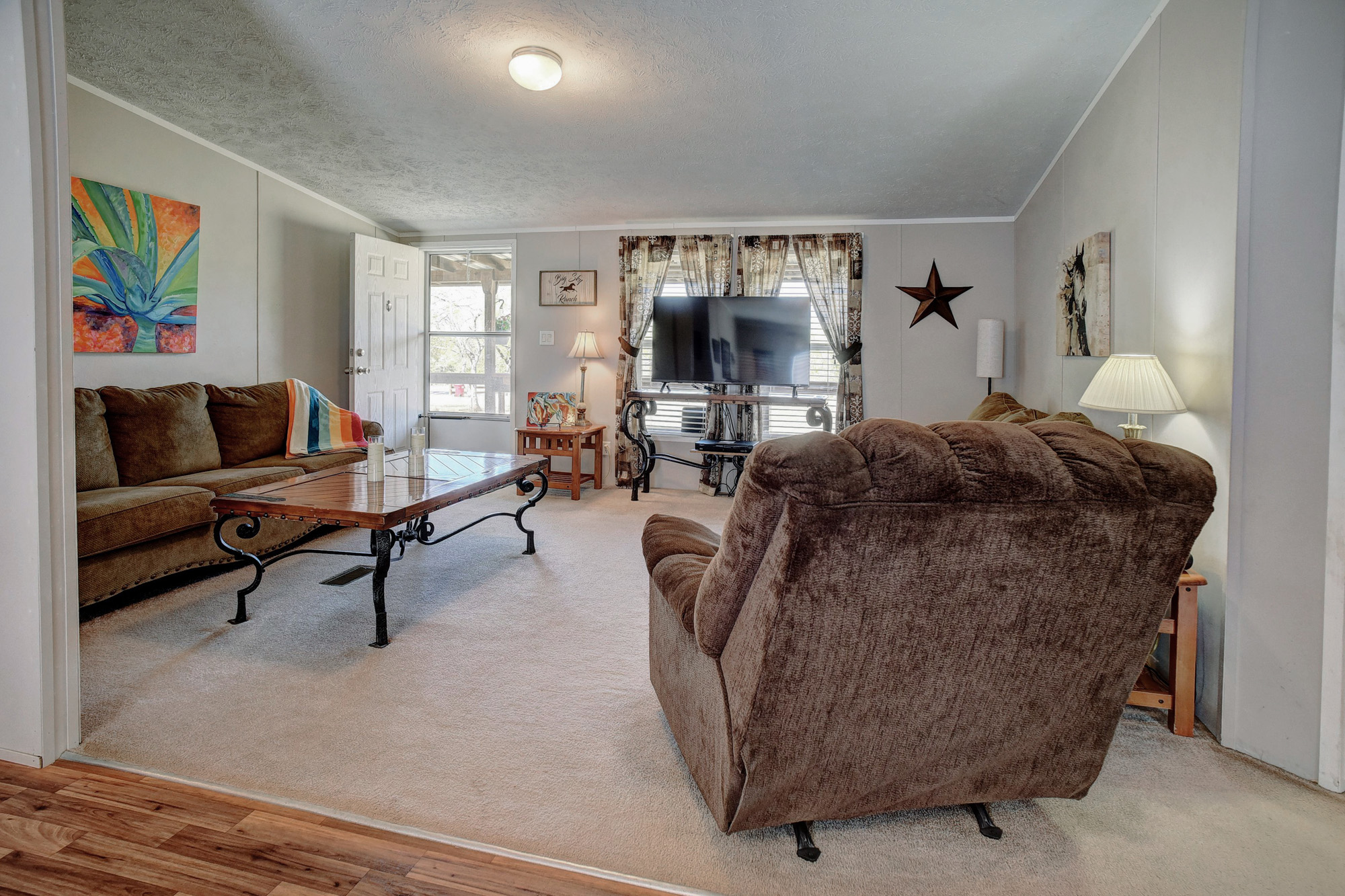 4495 Taylorsville Road Red Rock, TX 78662 - Photo 14 of 40 How wonderful to enjoy the comfort of your living room while peering out at the great outdoors... all yours!
