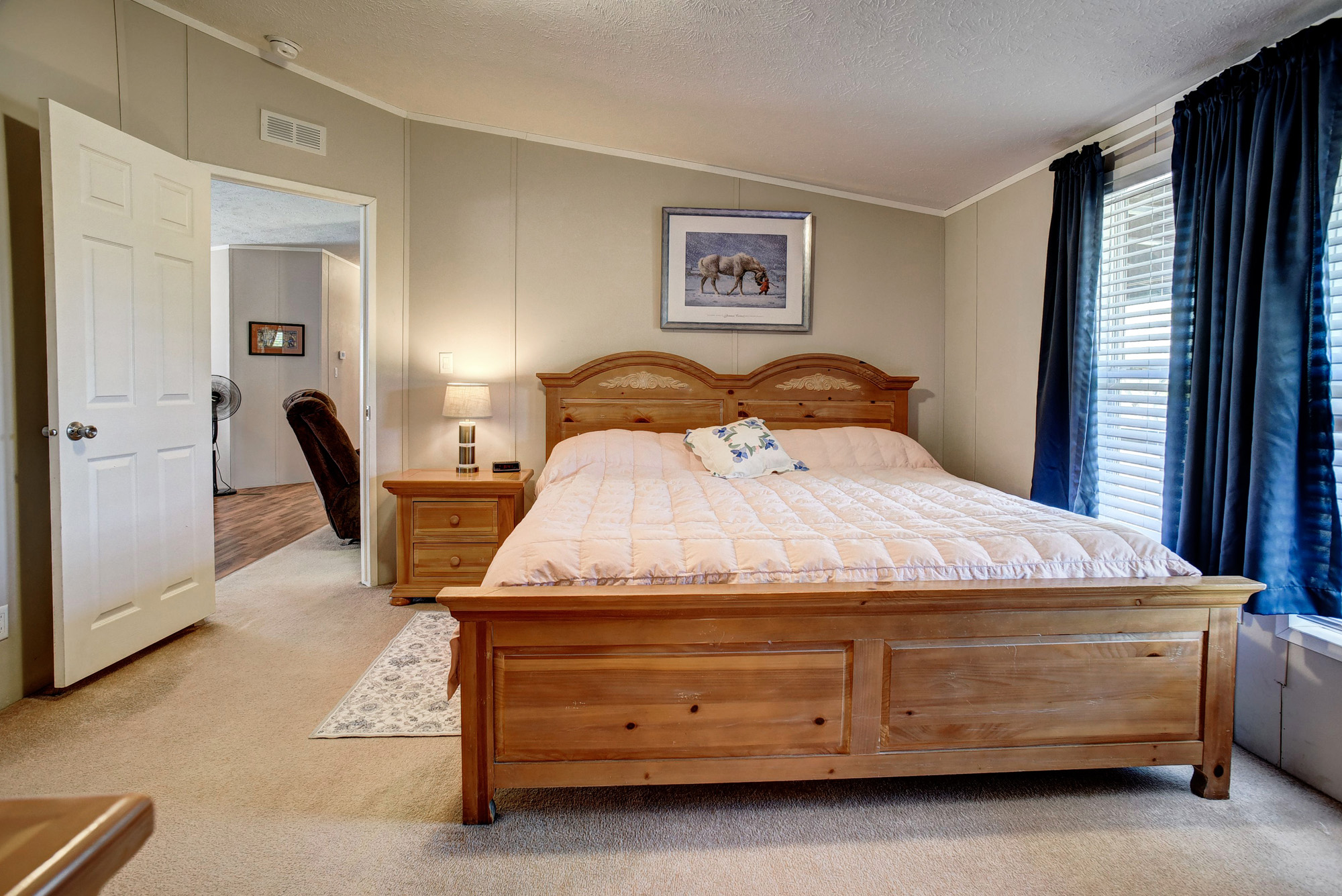 4495 Taylorsville Road Red Rock, TX 78662 - Photo 18 of 40 The location of the primary bedroom offers quick and easy access to the living room and kitchen for your convenience!