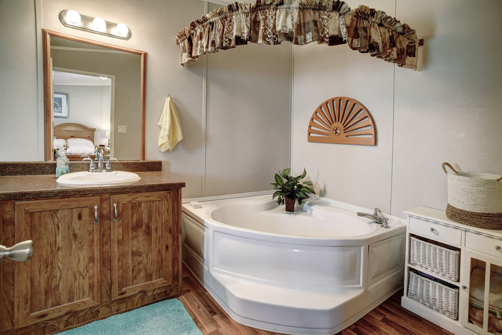4495 Taylorsville Road Red Rock, TX 78662 - Photo 20 of 40 The corner soaking tub offers a wonderful retreat at the end of a long day.