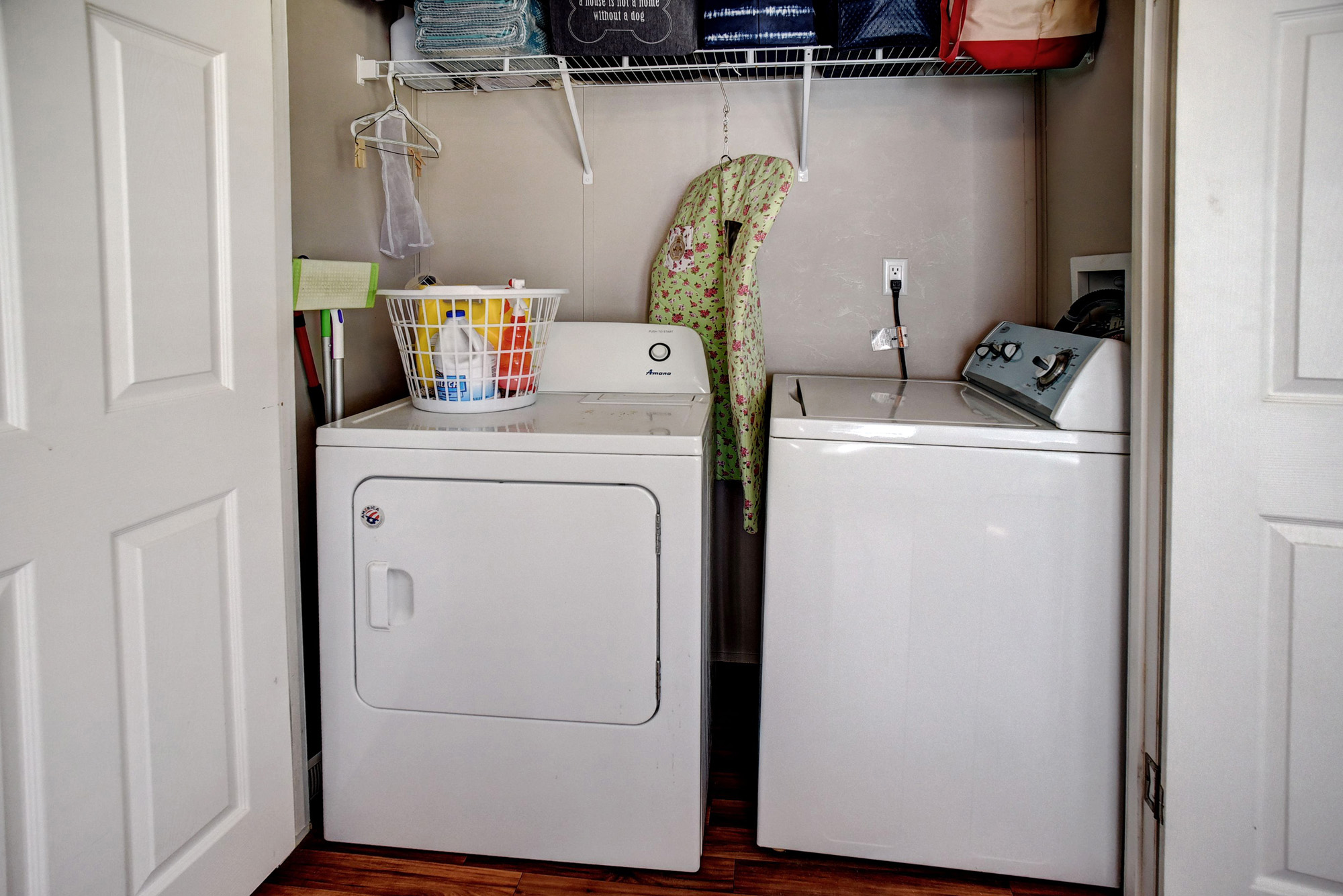 4495 Taylorsville Road Red Rock, TX 78662 - Photo 27 of 40 The laundry closet is tucked away nicely, and the washer and dryer convey!