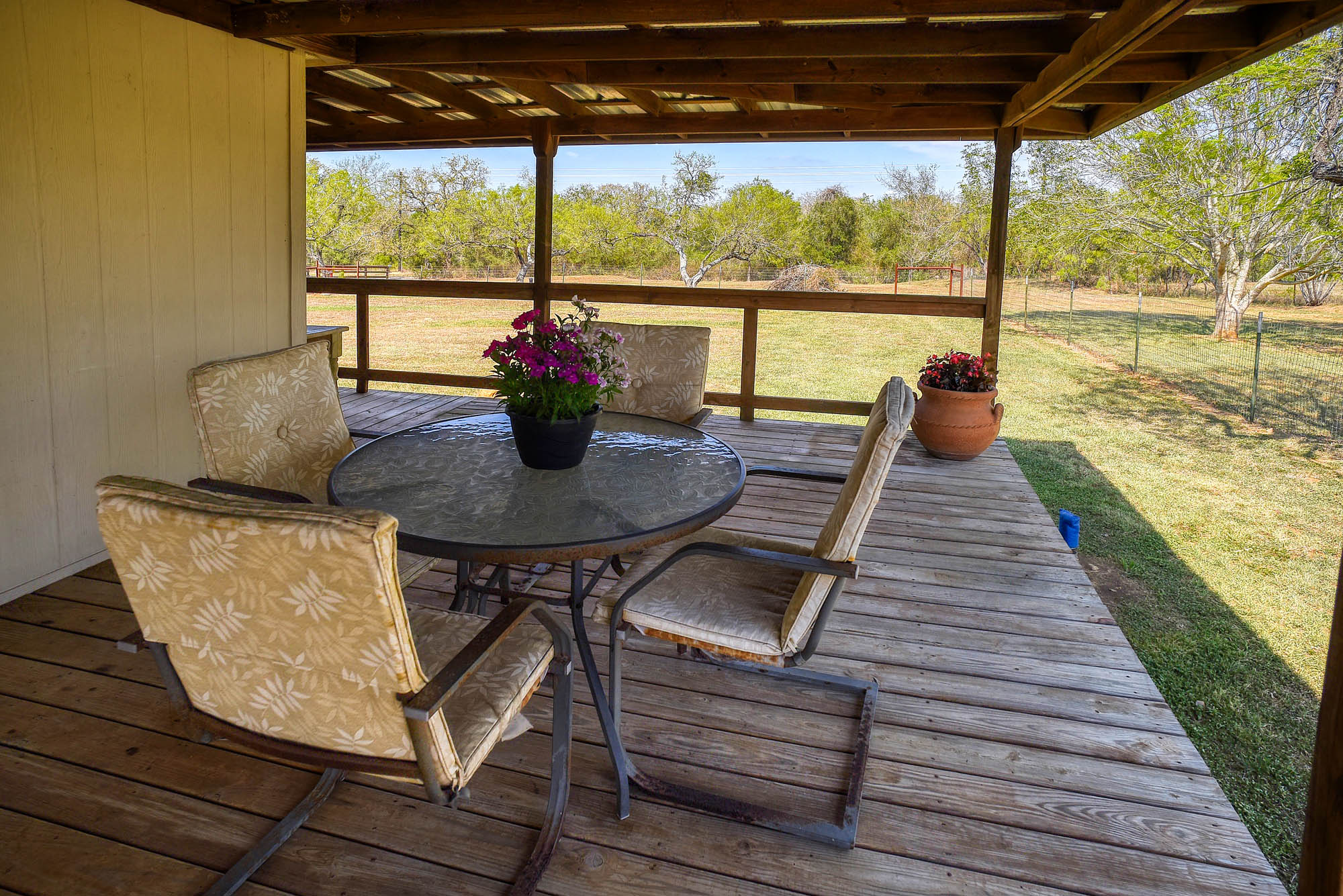 4495 Taylorsville Road Red Rock, TX 78662 - Photo 28 of 40 The wrap-around porch will steal your heart!