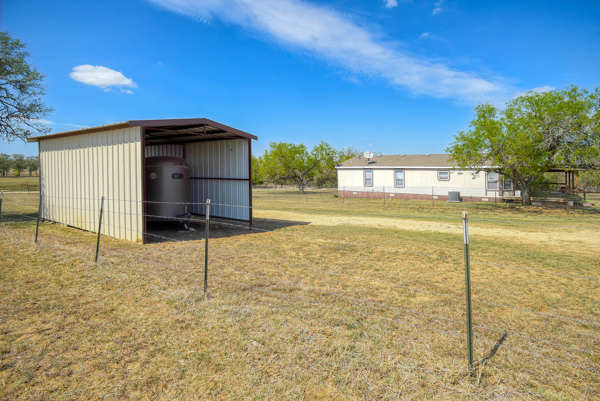 4495 Taylorsville Road Red Rock, TX 78662 - Photo 37 of 40 More covered parking to protect your stock trailers, boat, or whatever toys you wish.