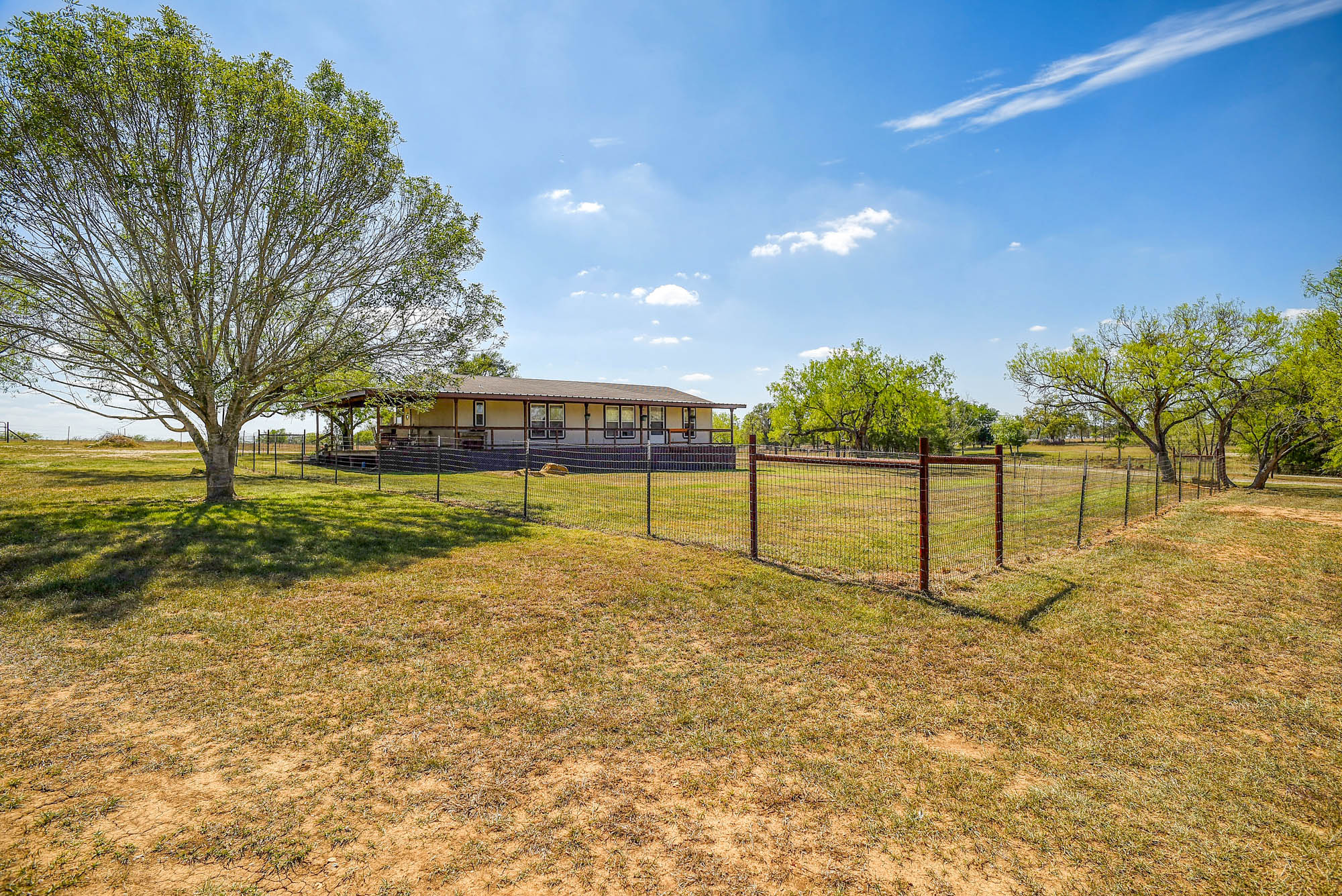 4495 Taylorsville Road Red Rock, TX 78662 - Photo 5 of 40 The fully fenced property offers an extra layer of security for you and your livestock.