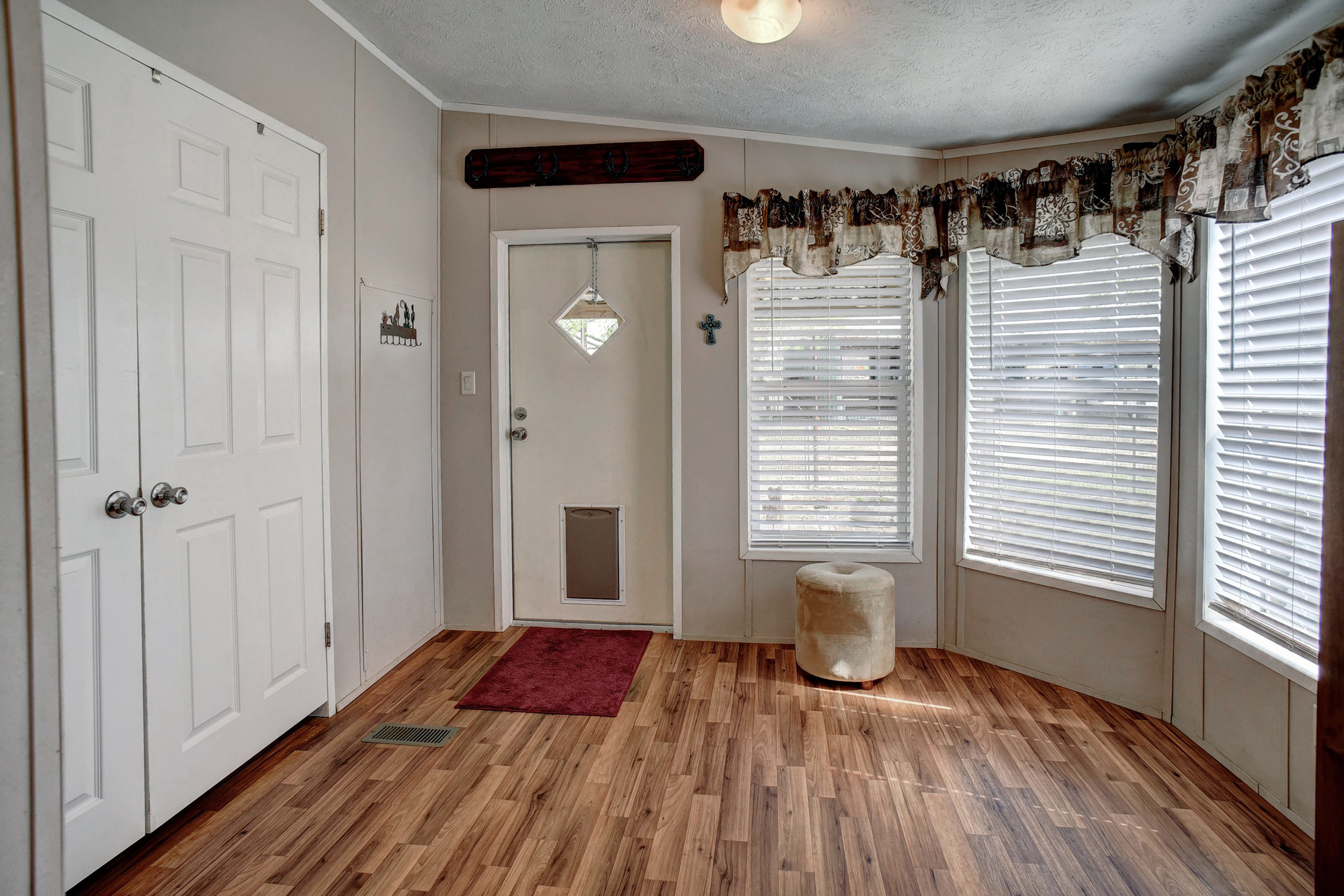 4495 Taylorsville Road Red Rock, TX 78662 - Photo 8 of 40 This home offers an abundance of natural light, but the window coverings also give the option of shade.