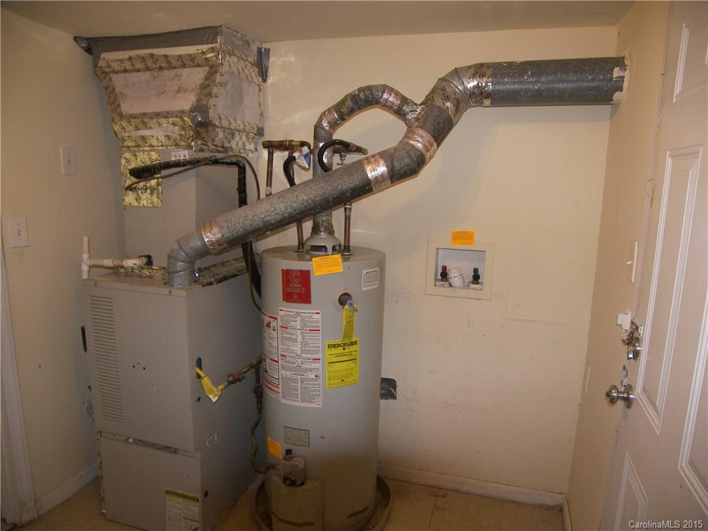 6200 Running Deer Road Charlotte, NC 28214 - Photo 13 of 17 a close view of water heater room