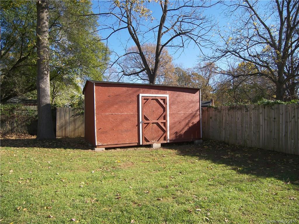 6200 Running Deer Road Charlotte, NC 28214 - Photo 14 of 17 a view of outdoor space with garden and trees