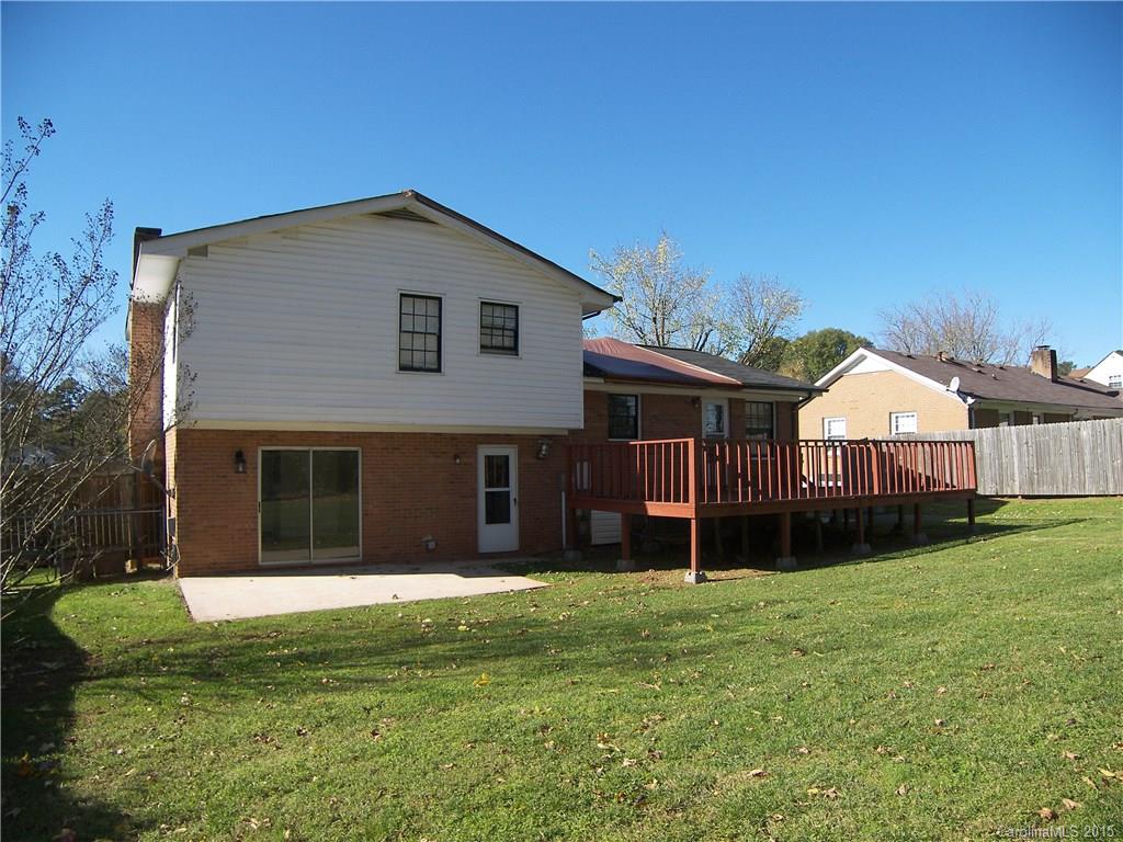 6200 Running Deer Road Charlotte, NC 28214 - Photo 15 of 17 a view of a house with a yard