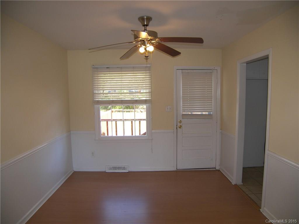 6200 Running Deer Road Charlotte, NC 28214 - Photo 3 of 17 a view of an empty room with a window