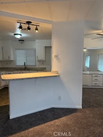 a house view with a backyard space