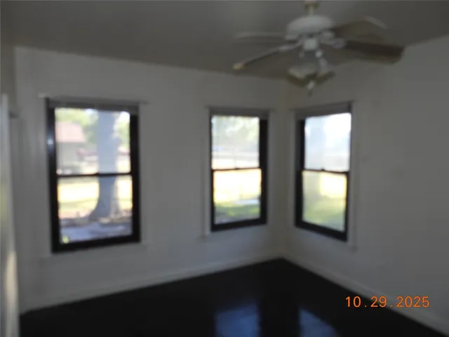 an empty room with windows