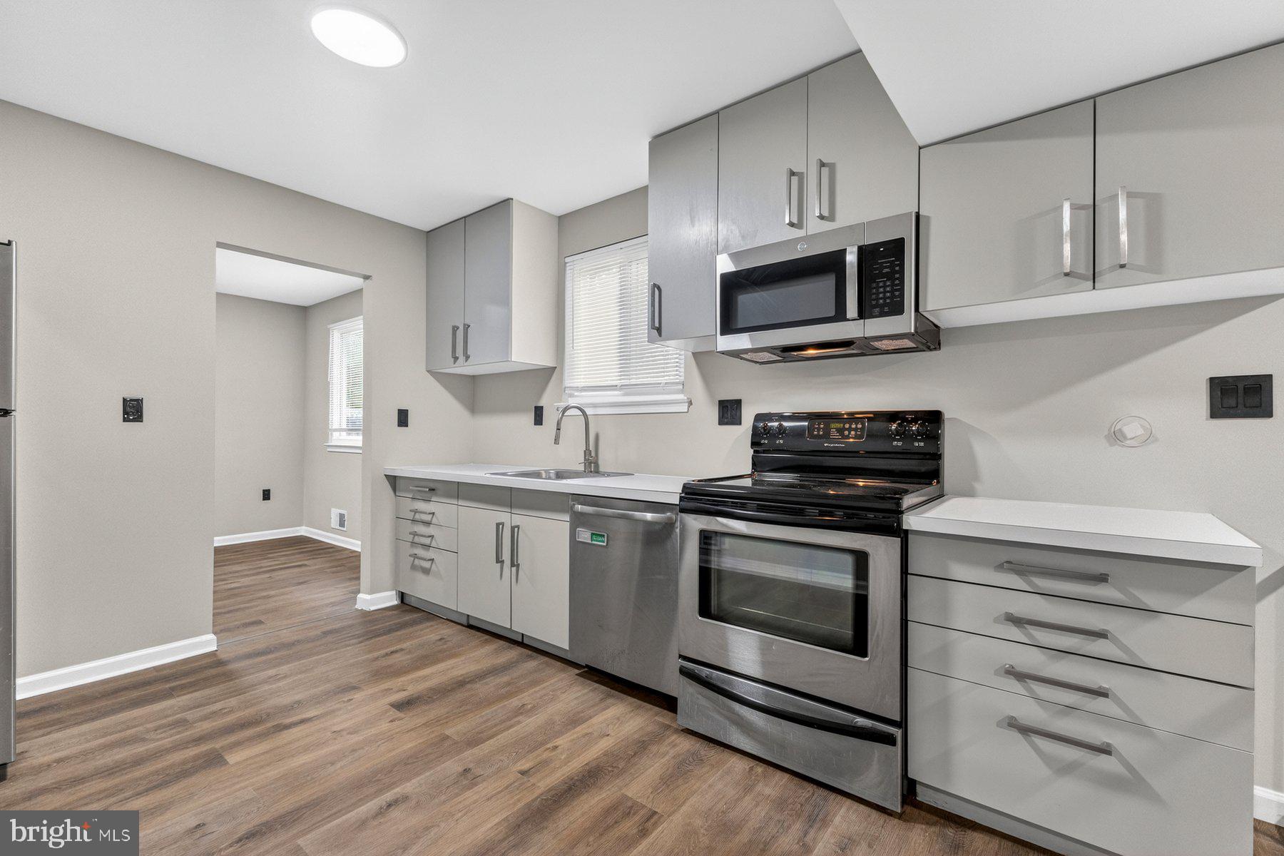 4810 A Wheeler Road Temple Hills, MD 20748 - Photo 17 of 28 Sleek modern kitchen with stylish finishes.