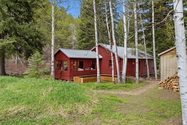 6631 Pine Springs Road Kamas, UT 84036 - Photo 9 of 48 View of front of home with log veneer siding and a metal roof