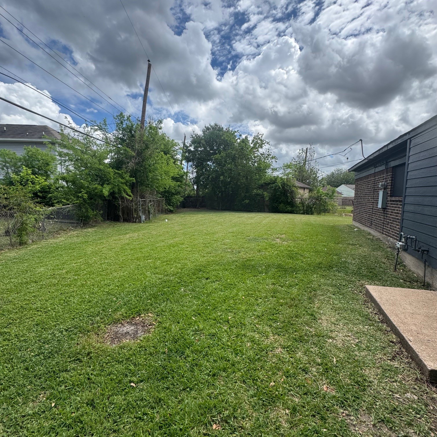 11803 Edgar Street Houston, TX 77047 - Photo 14 of 14 a view of a garden with a fountain