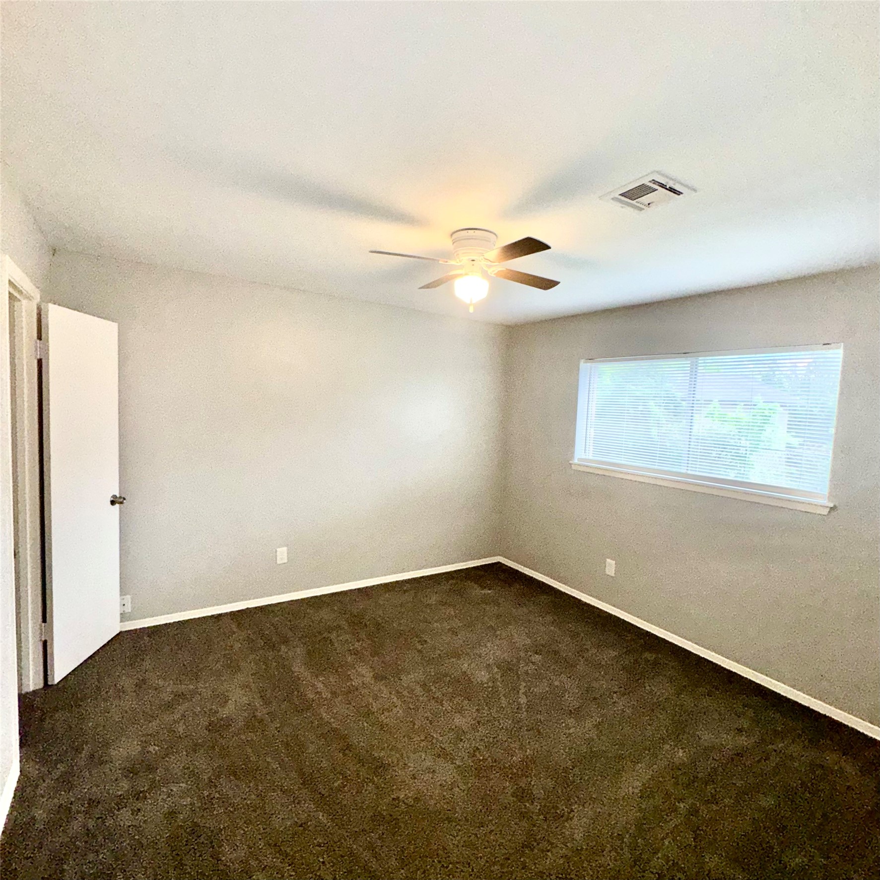 11803 Edgar Street Houston, TX 77047 - Photo 9 of 14 a view of an empty room with a window
