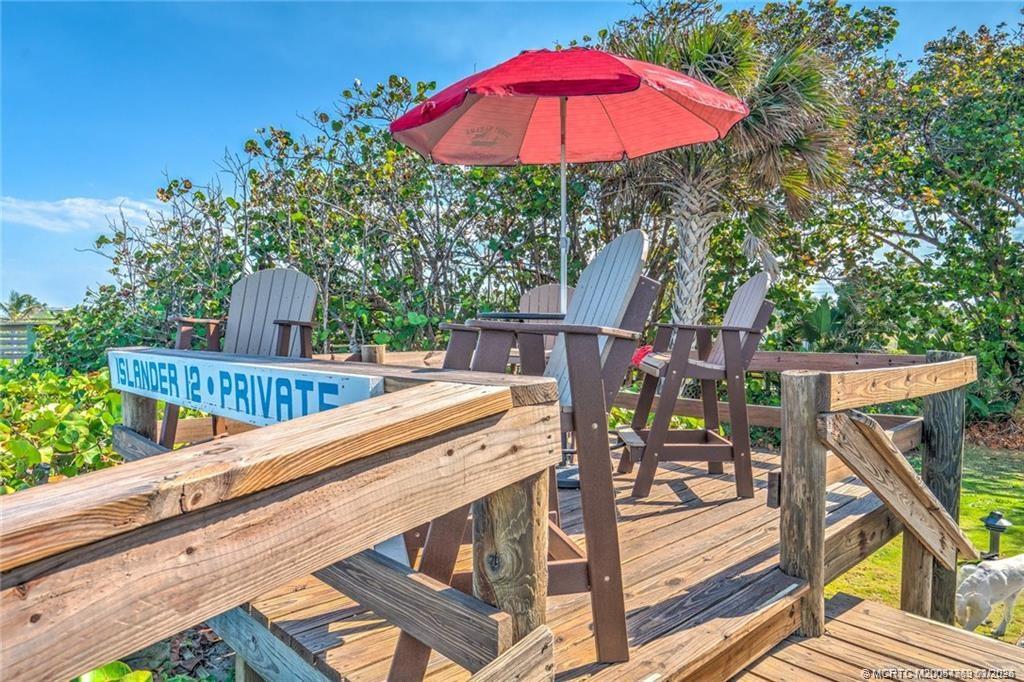 1289 Northeast Ocean Boulevard, Unit 6 Stuart, FL 34996 - Photo 2 of 55 swimming pool view with a seating space