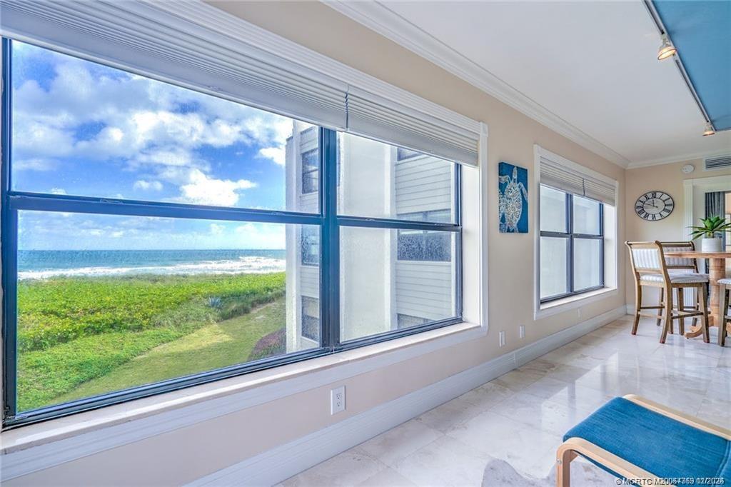 1289 Northeast Ocean Boulevard, Unit 6 Stuart, FL 34996 - Photo 25 of 55 a view of a room with furniture and windows