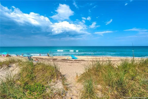a view of a building with a yard
