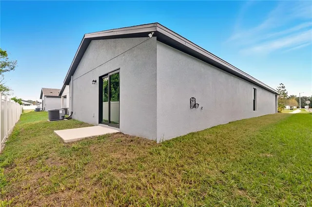 a view of a backyard of the house