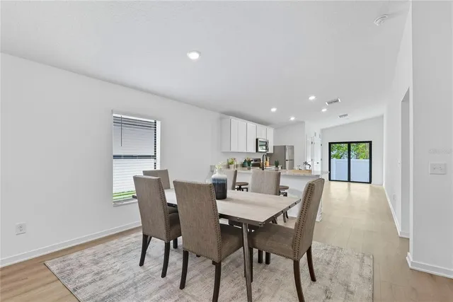 a view of a dining room with furniture