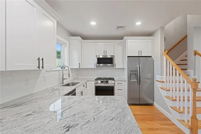 $674,900 | 1 Old County Village Way, Unit E, Smithfield, RI 02917