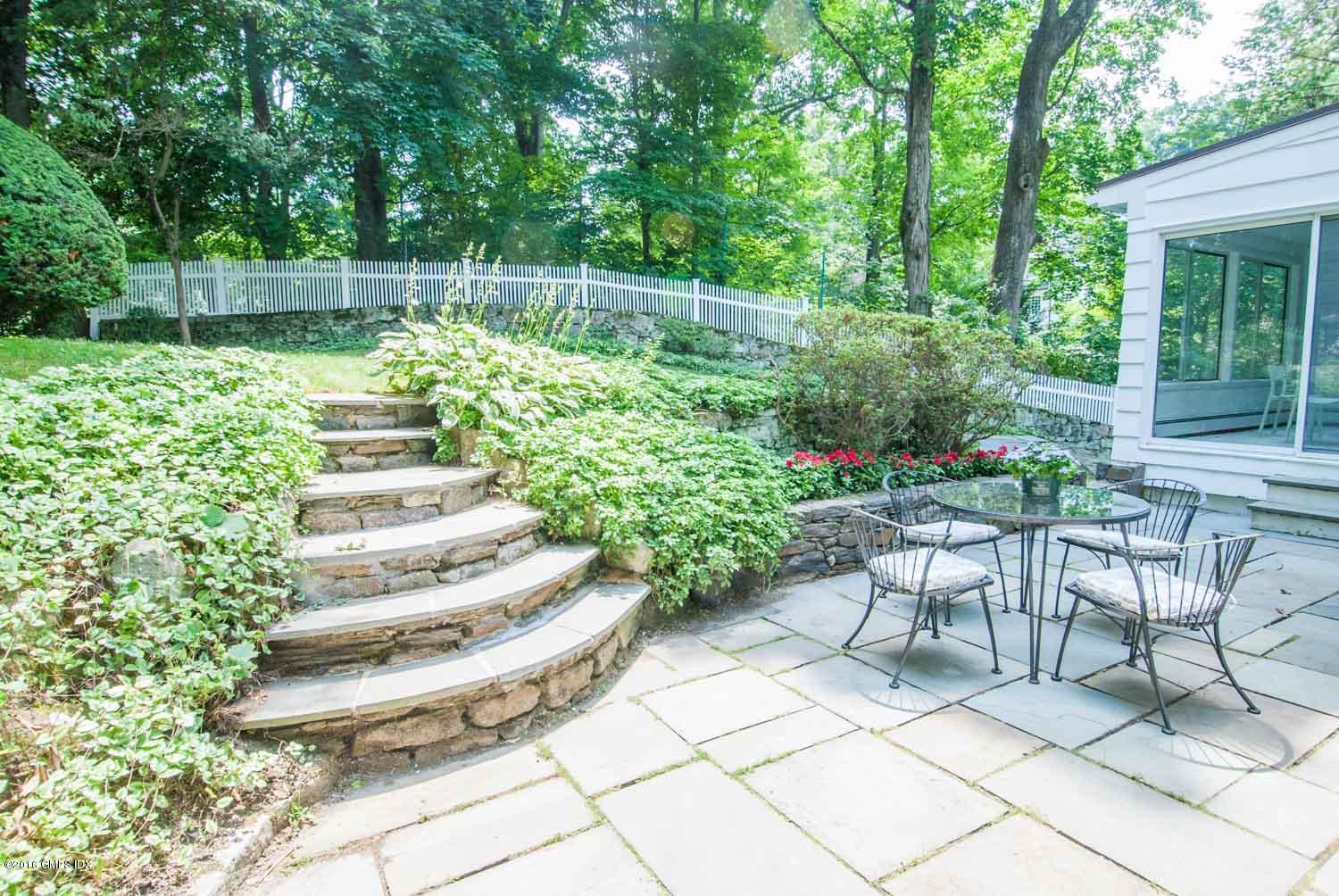 4 Ridgebrook Road Greenwich, CT 06830 - Photo 13 of 17 a view of yard with seating and green space