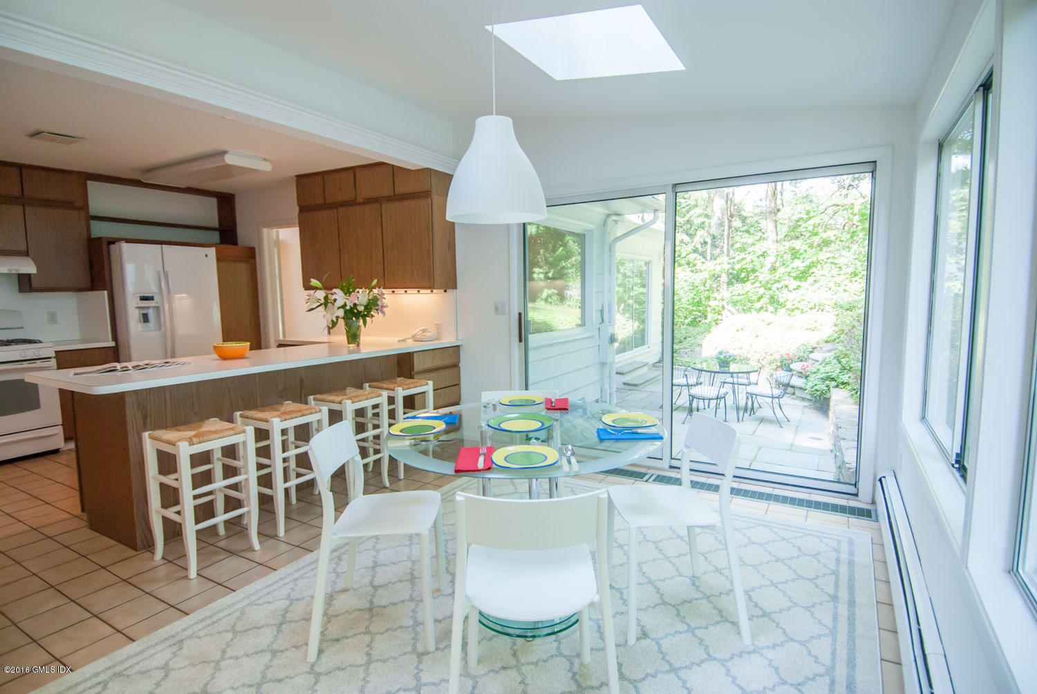 4 Ridgebrook Road Greenwich, CT 06830 - Photo 4 of 17 a very nice looking dining room with a large window
