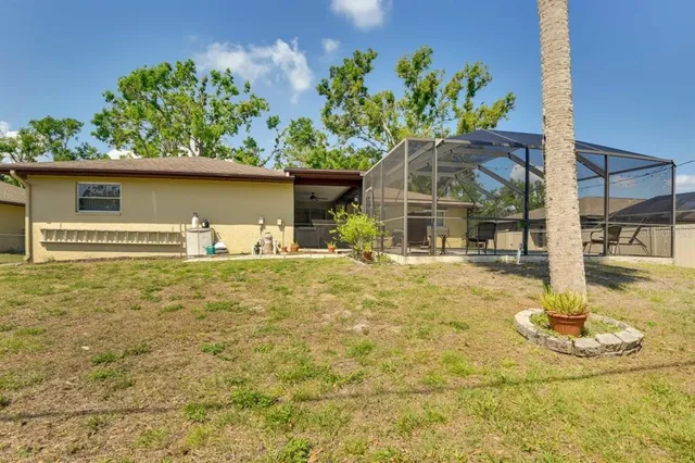 a backyard of house with a swimming pool