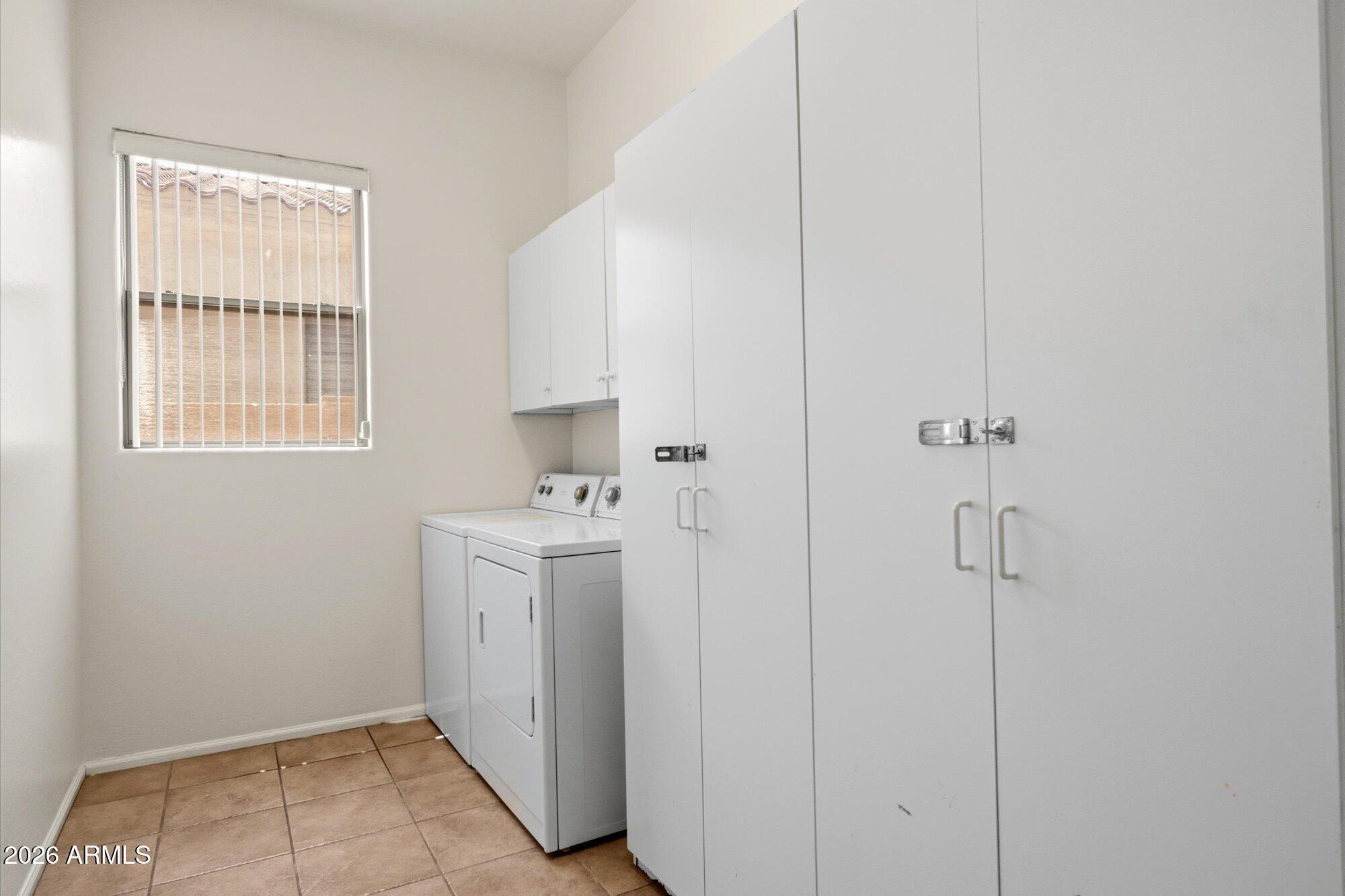 6229 South Moccasin Trail Gilbert, AZ 85298 - Photo 21 of 25 Utility Room with Cabinetry