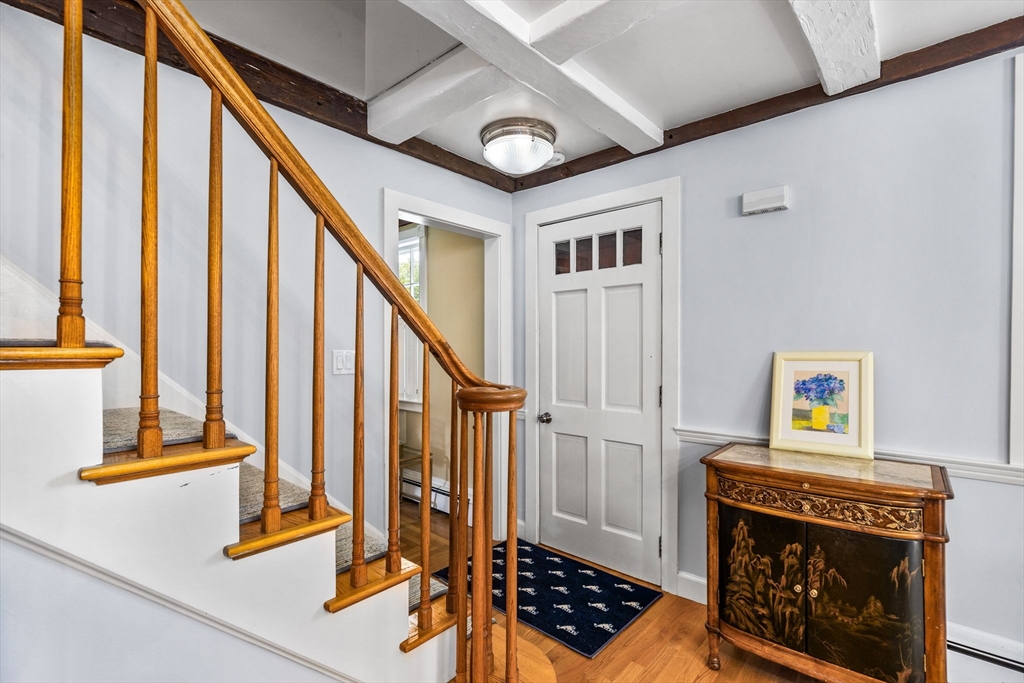 17 Pleasant Street Hingham, MA 02043 - Photo 20 of 41 a view of an entryway with wooden floor and livingroom
