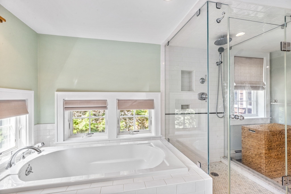 17 Pleasant Street Hingham, MA 02043 - Photo 24 of 41 a bathroom with a bathtub and a shower