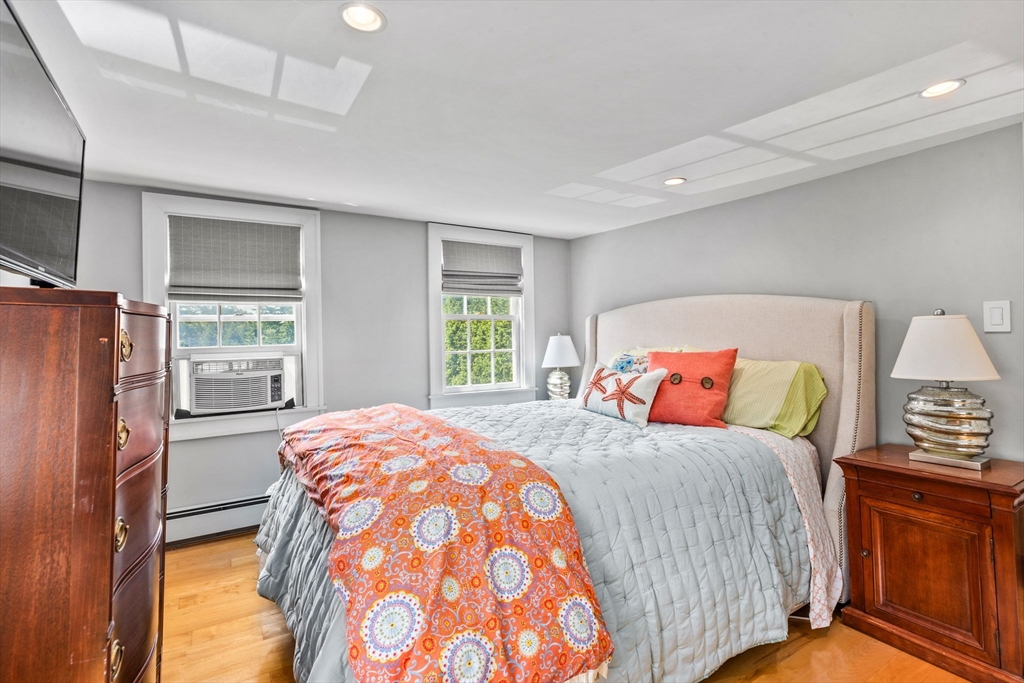 17 Pleasant Street Hingham, MA 02043 - Photo 25 of 41 a bedroom with a bed and a window