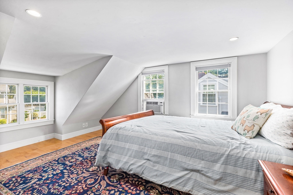 17 Pleasant Street Hingham, MA 02043 - Photo 26 of 41 a bedroom with a bed and a large window