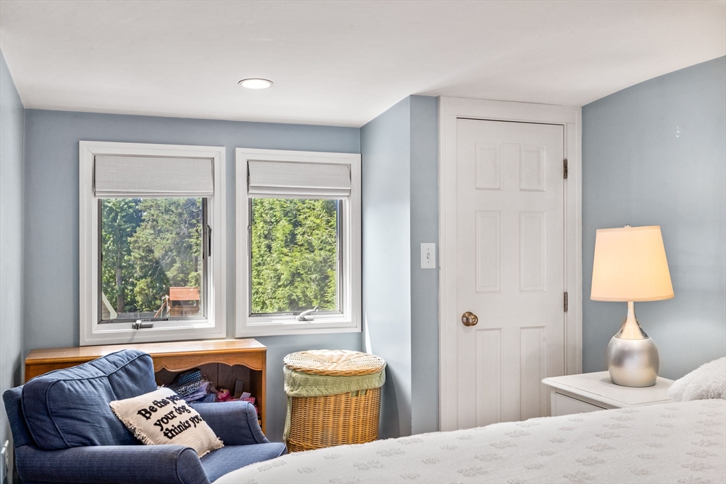 17 Pleasant Street Hingham, MA 02043 - Photo 29 of 41 a bedroom with a bed and a window