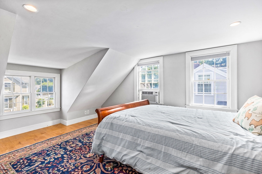 17 Pleasant Street Hingham, MA 02043 - Photo 30 of 41 a bedroom with a bed and a window