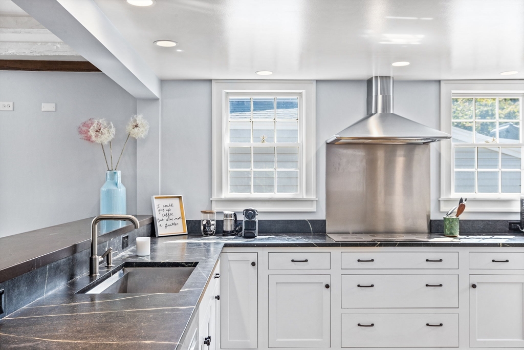 17 Pleasant Street Hingham, MA 02043 - Photo 3 of 41 a kitchen with granite countertop a sink and a stove