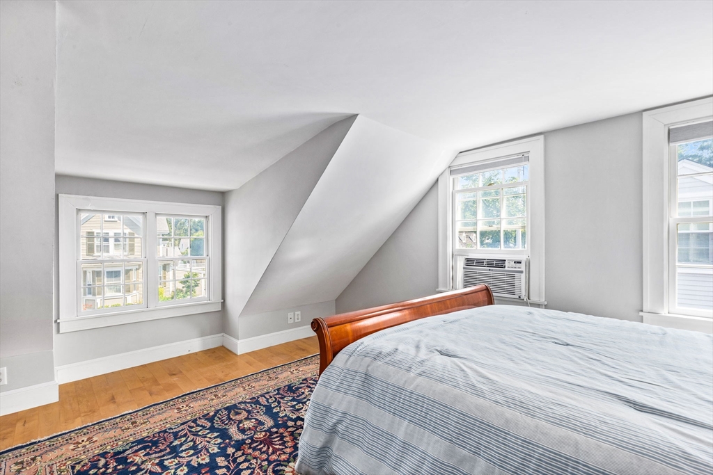 17 Pleasant Street Hingham, MA 02043 - Photo 31 of 41 a bedroom with a bed and a window with outer view