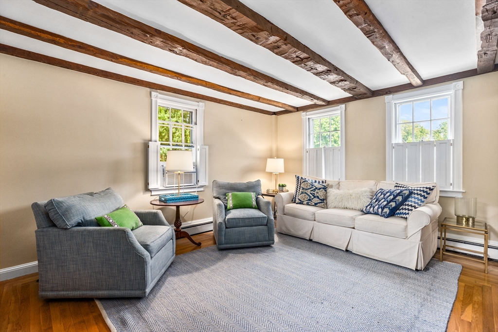 17 Pleasant Street Hingham, MA 02043 - Photo 33 of 41 a living room with furniture and a large window