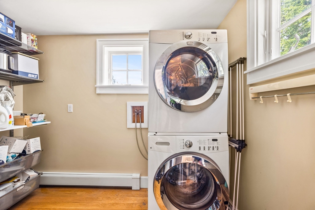 17 Pleasant Street Hingham, MA 02043 - Photo 35 of 41 a view of a bedroom with washer and dryer